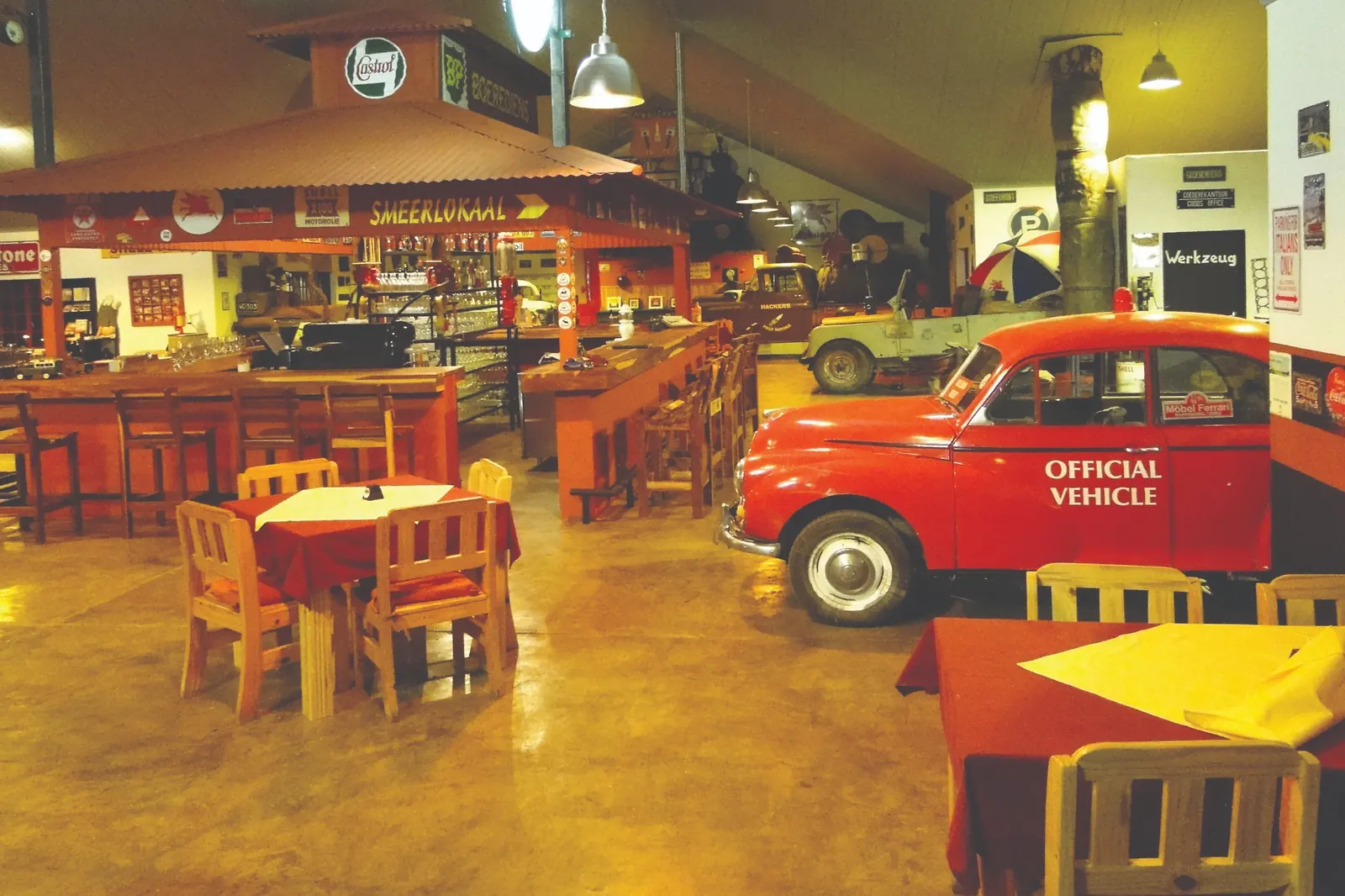 Vintage cars inside the Canyon Roadhouse restaurant