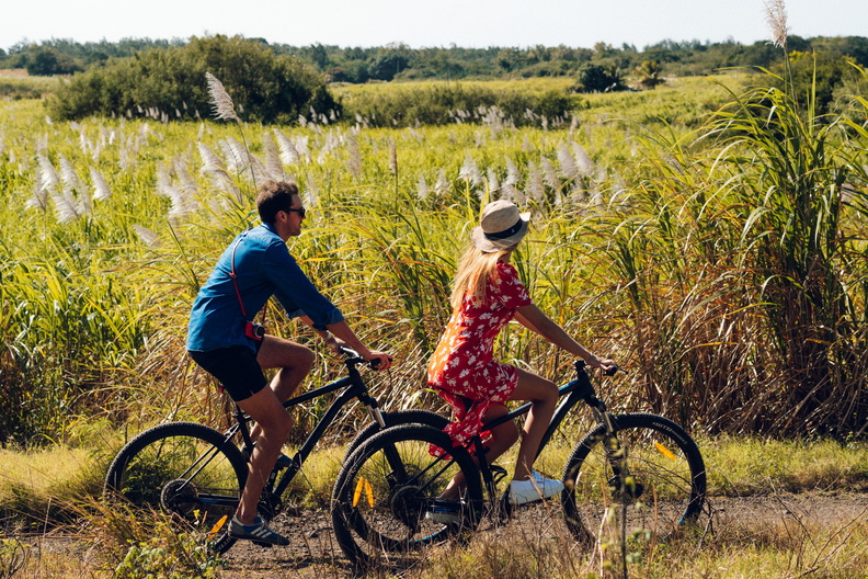 Couple cycling in Mauritius