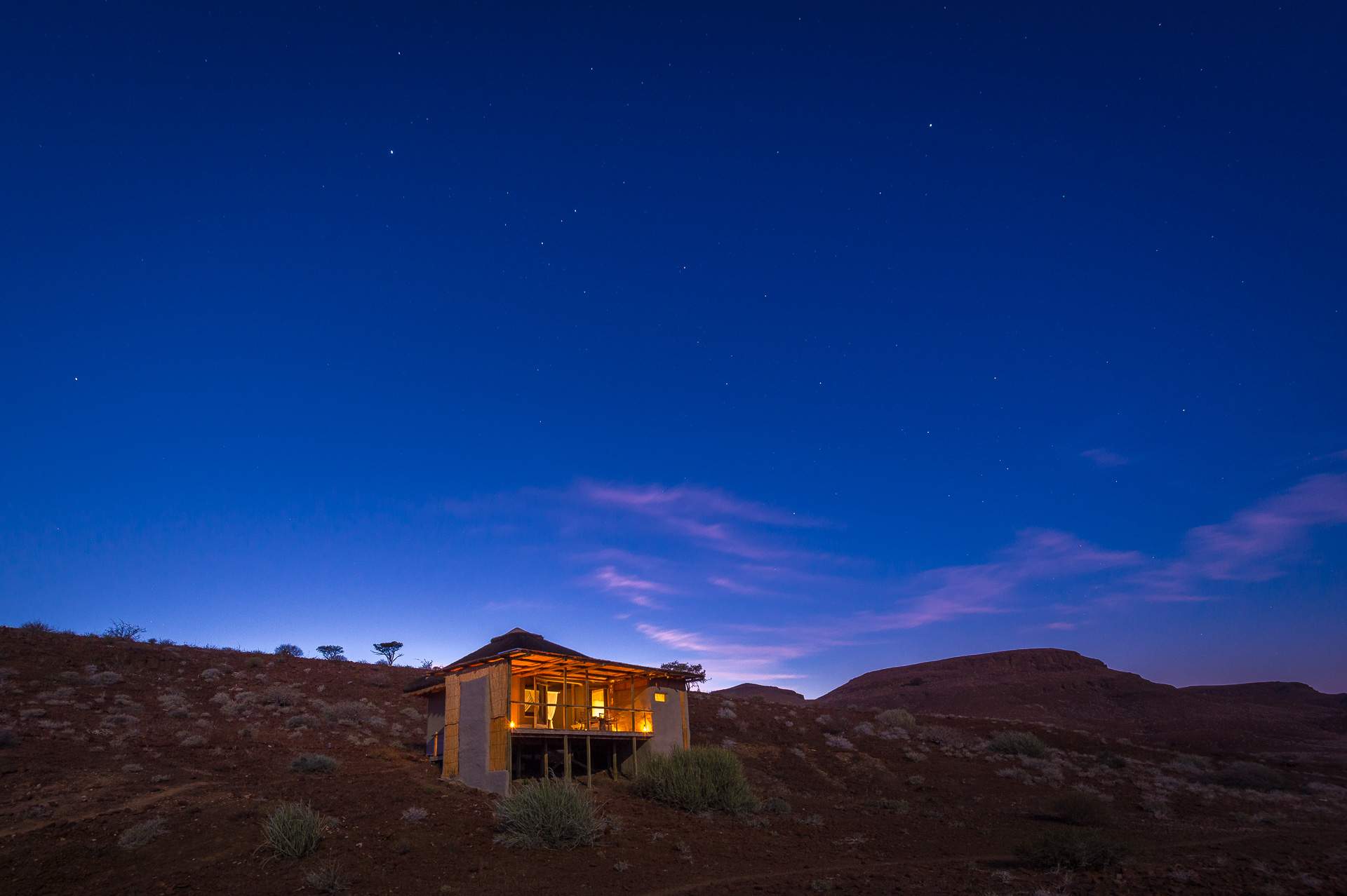 Damaraland Camp romantic safari sunset Namibia