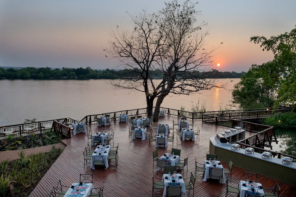 Outdoor seating overlooking the Zambezi River in Livingstone