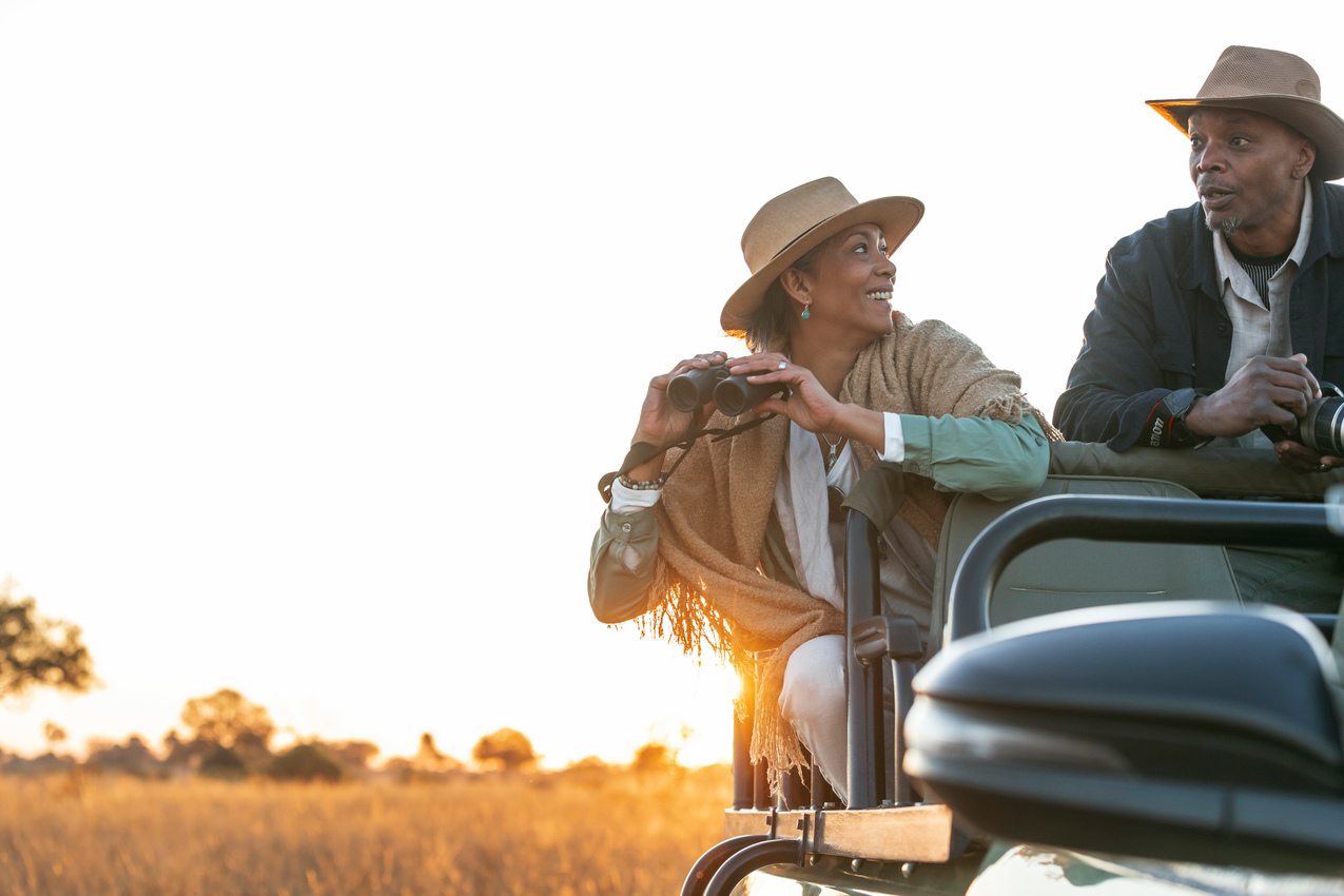 Couple on a game drive during a Hwange honeymoon