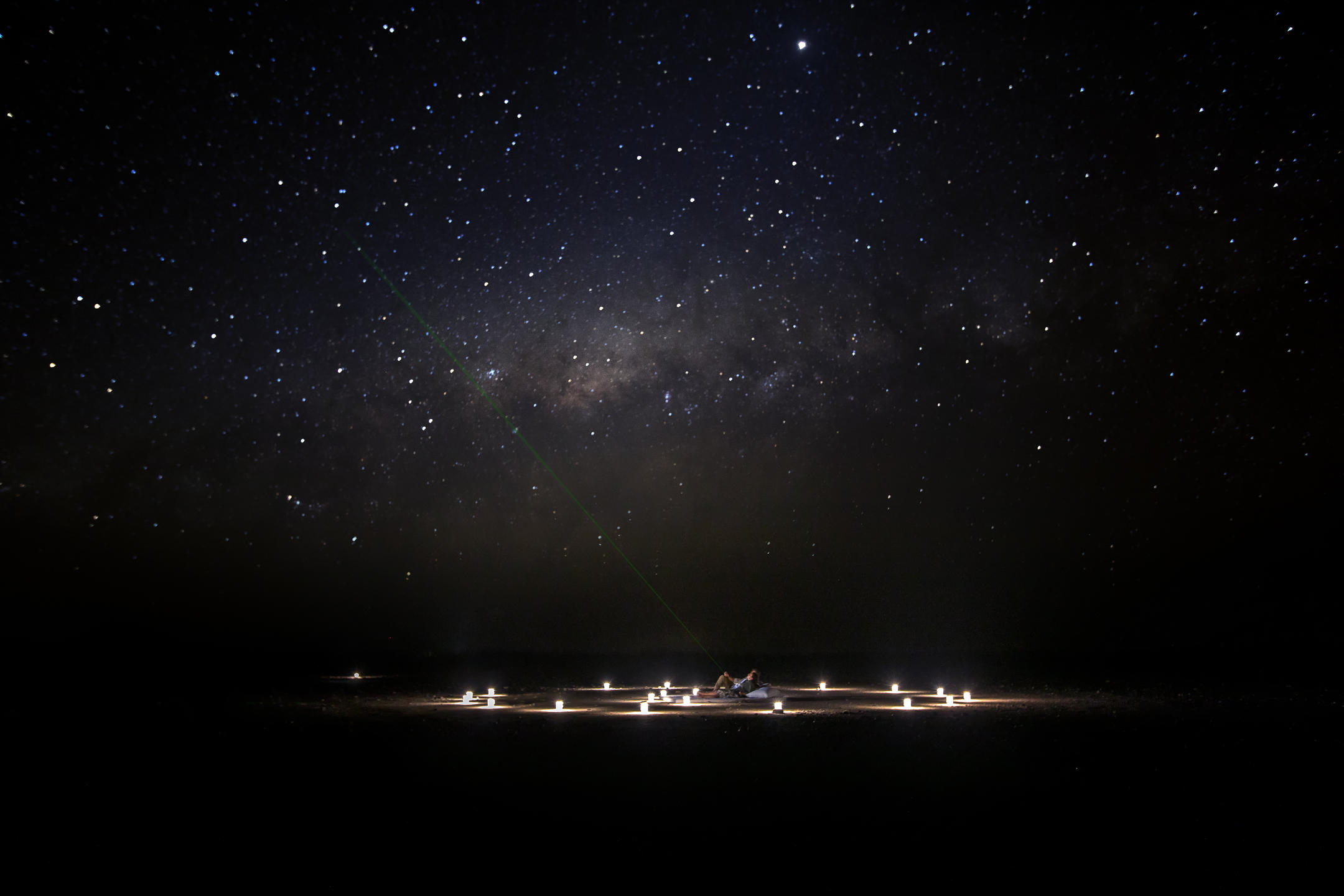 Couple stargazing at Little Kulala